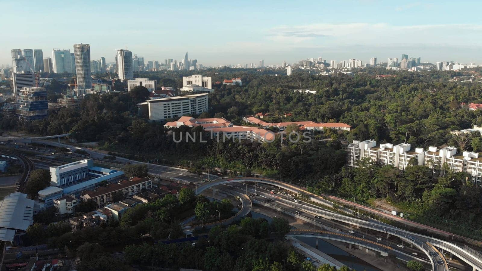 Aerial view of the silhouette of skyscrapers and the city center of Kuala Lumpur