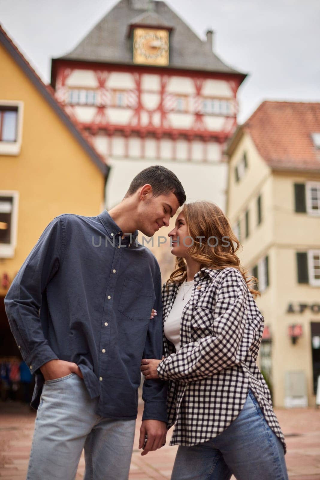 Young Cute Female Hugs Boyfriend. In Autumn Outdoor. Lovers Walking in Park. Attractive Funny Couple. Lovestory in Forest. Man and Woman. Cute Lovers in the Park. Family Concept. Happy Couple.