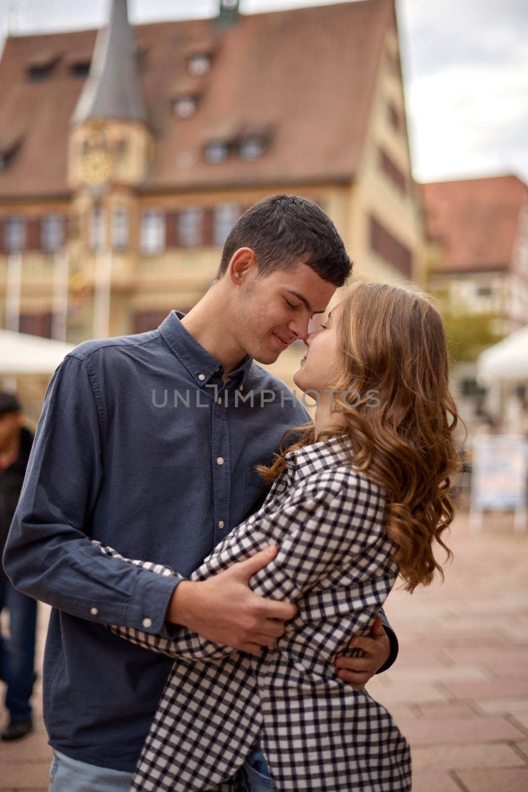 Warm Embrace of Teen Love in the Autumn Park. Capturing Teen Moments: Love Blossoms in Autumn's Embrace. Teenagers in Love: Embracing the Autumn Vibe by Andrii_Ko