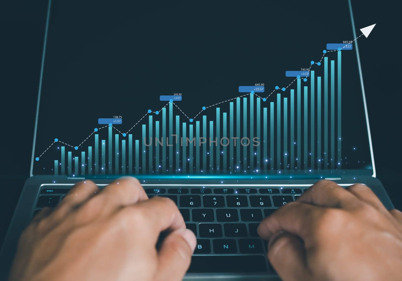 Human hand taps his finger on his computer to display a graph with growth for the future plan of organization. finance, management, plan, strategy. by Unimages2527