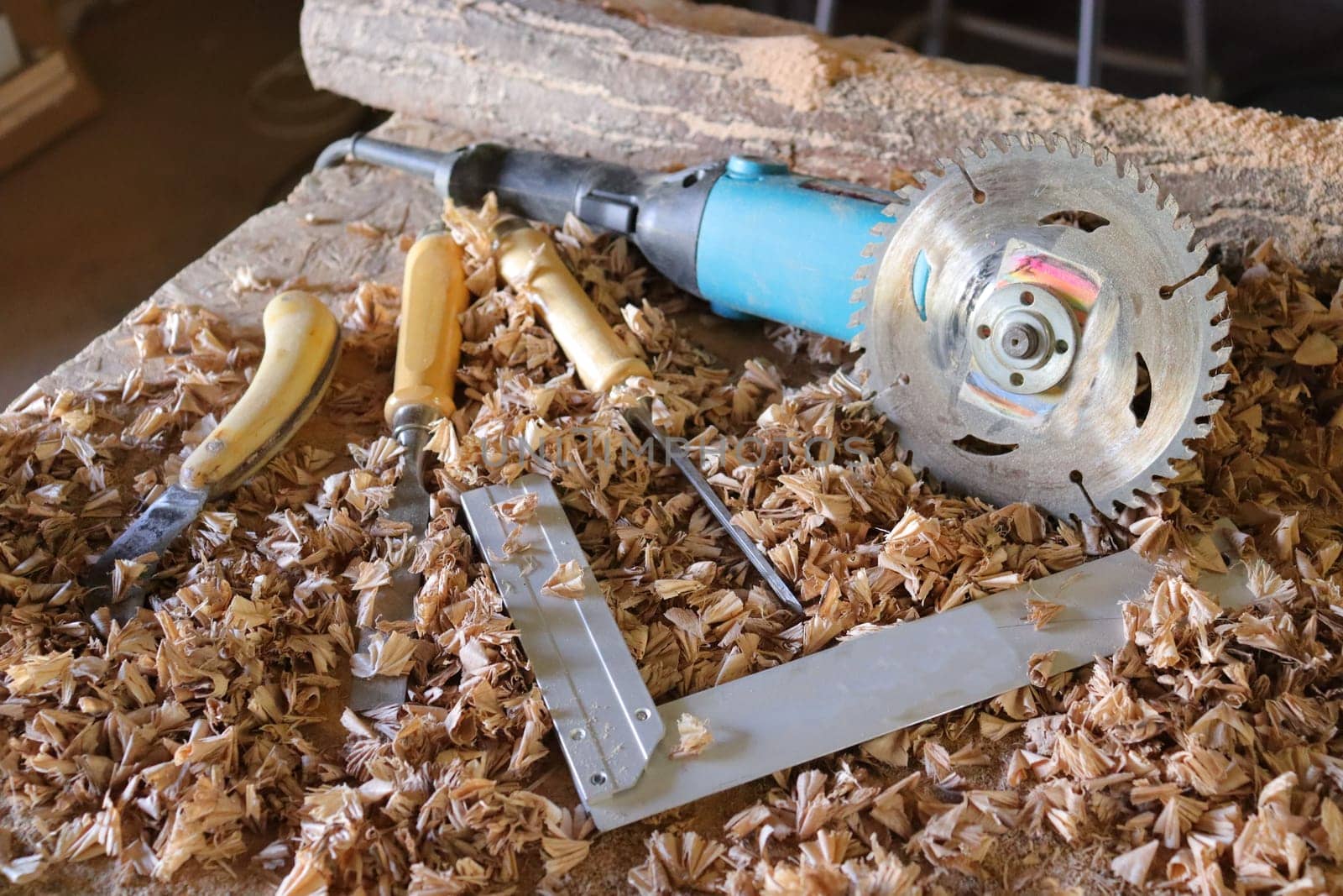 Hand tool on the background of the carpentry workshop. by AleksBay