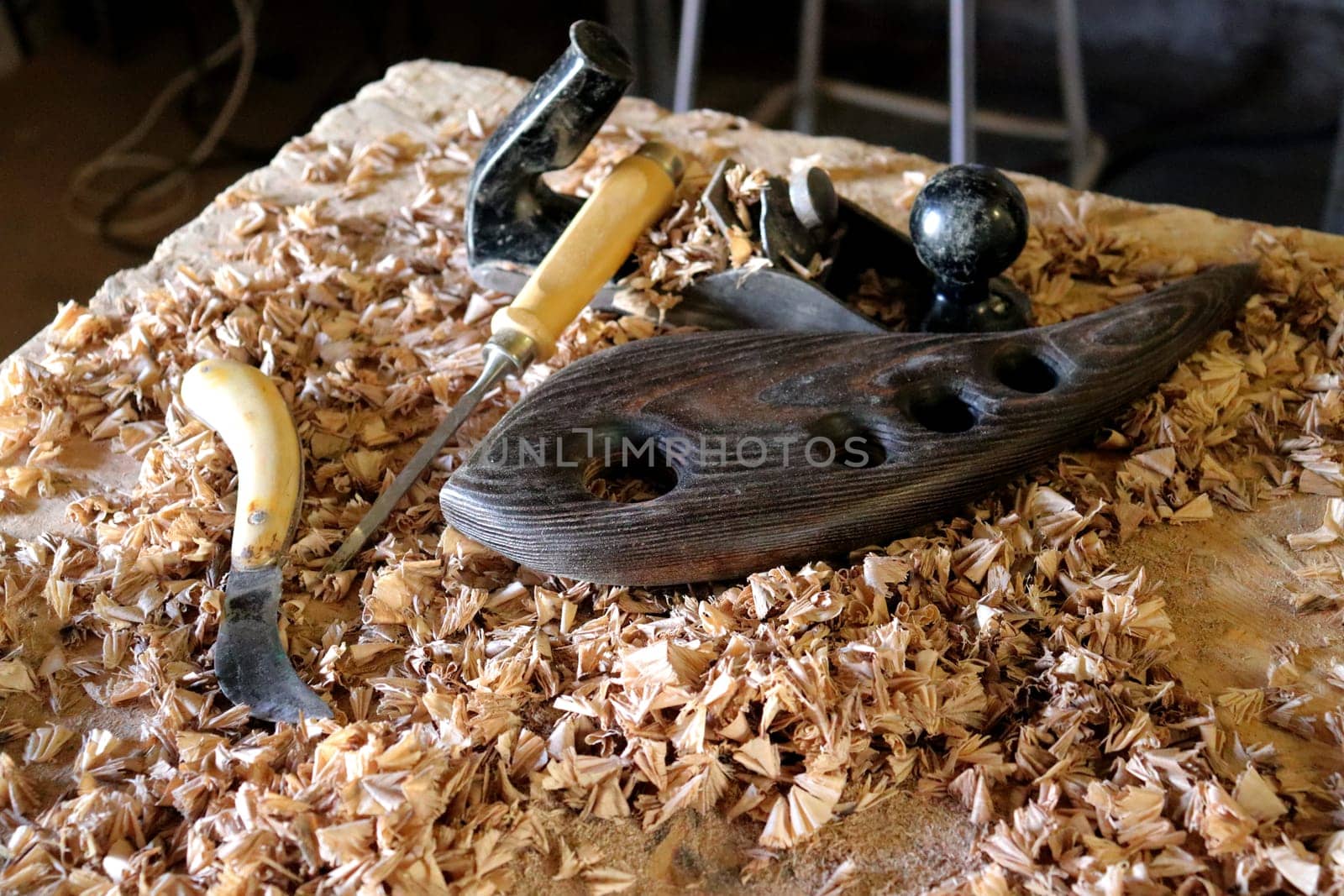 Hand tool on the background of the carpentry workshop. Photo in high quality.
