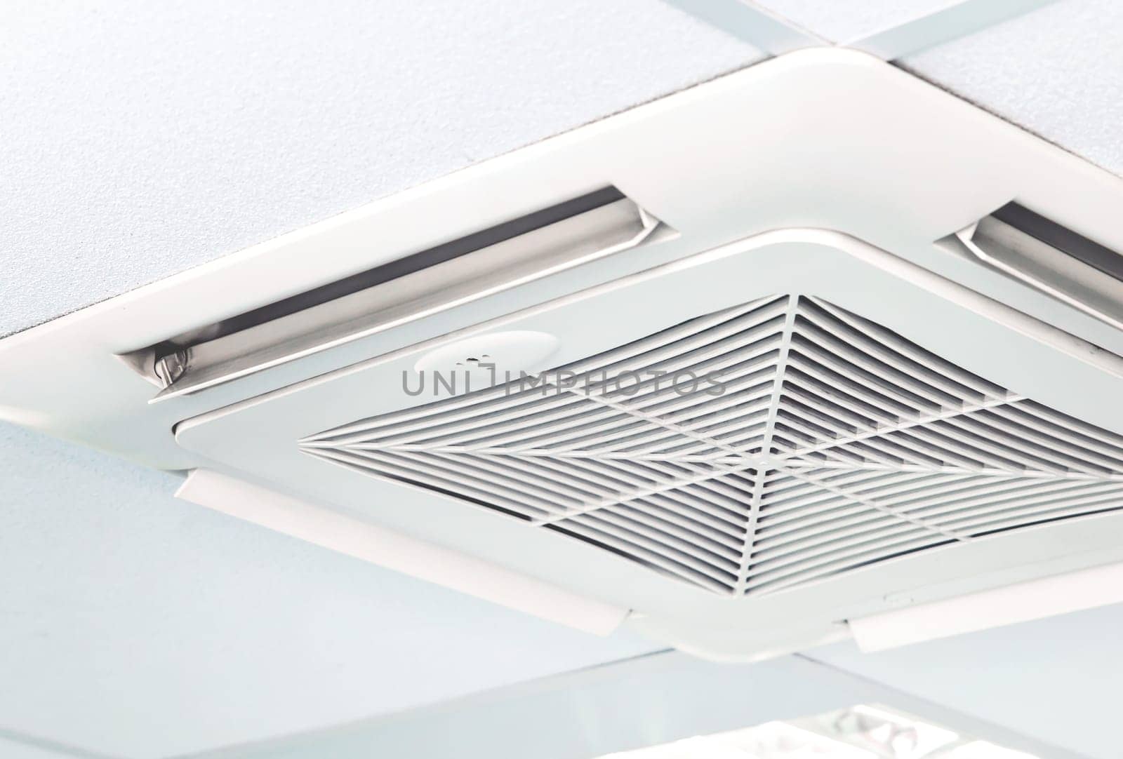 Modern air conditioning system installed on the ceiling