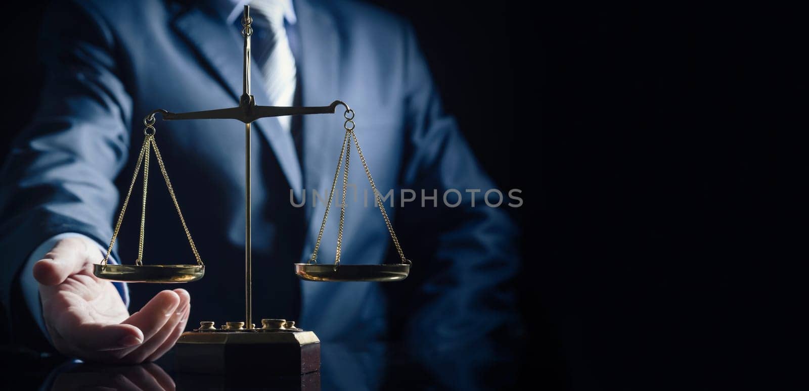 Weight scale of justice, lawyer in background by simpson33