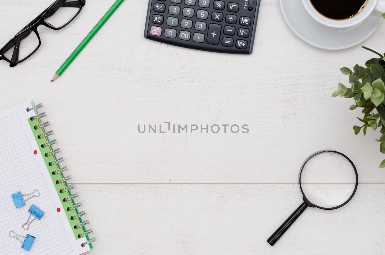 Office desk table layout. Flat lay composition on white wooden background