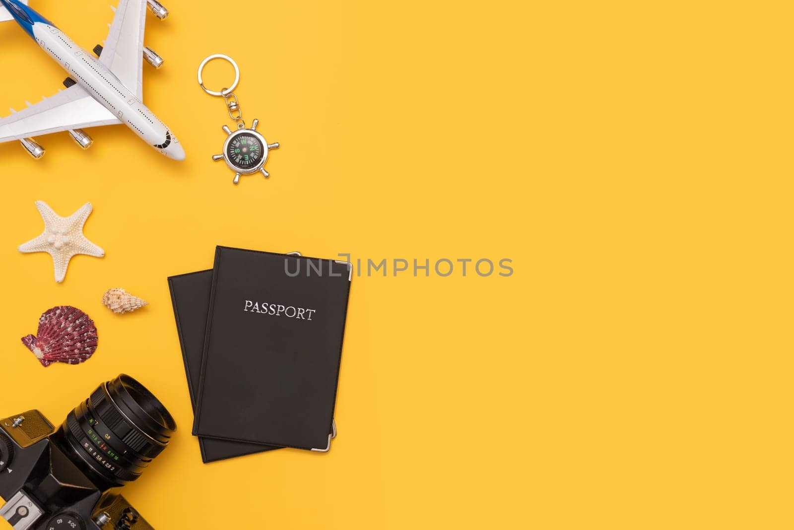 Summer Travel accessories on yellow background. Travel planning top view concept