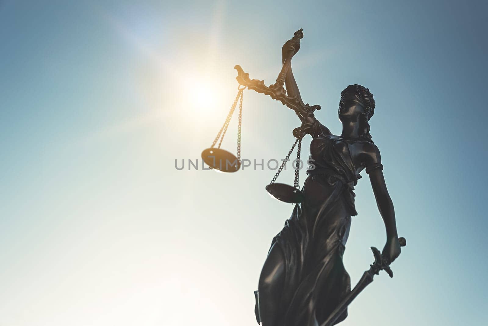 Lady justice. Statue of Justice, Themis on sky by simpson33