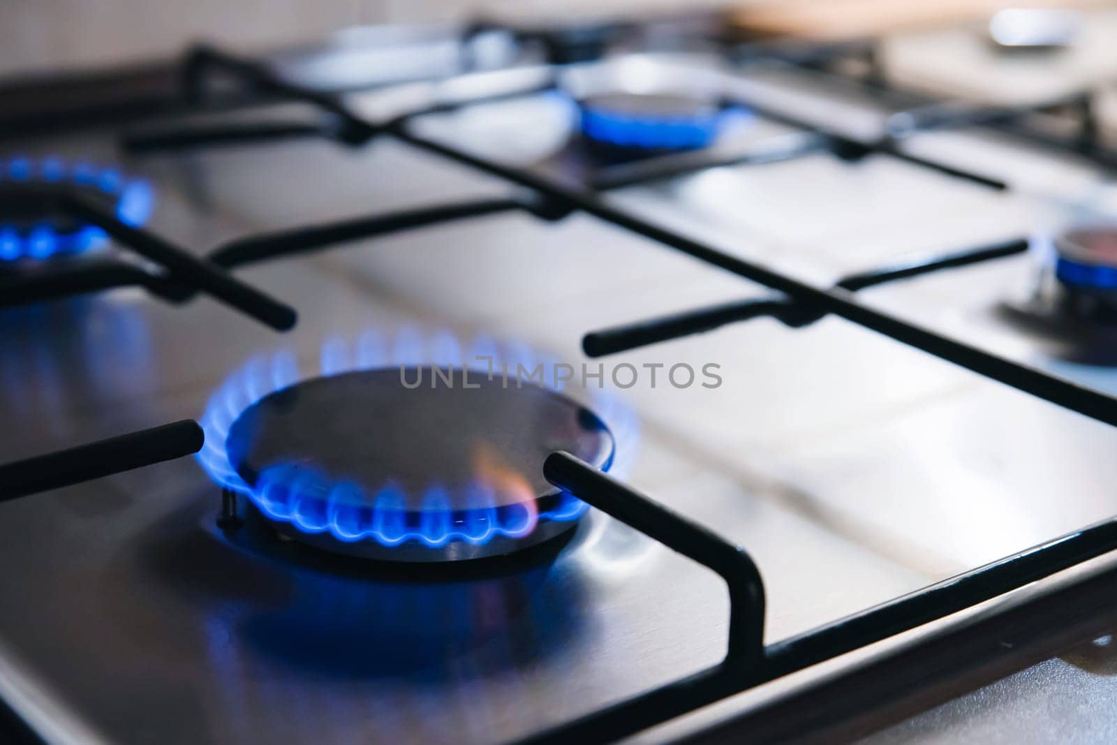 Gas kitchen stove cook with blue flames burning by simpson33