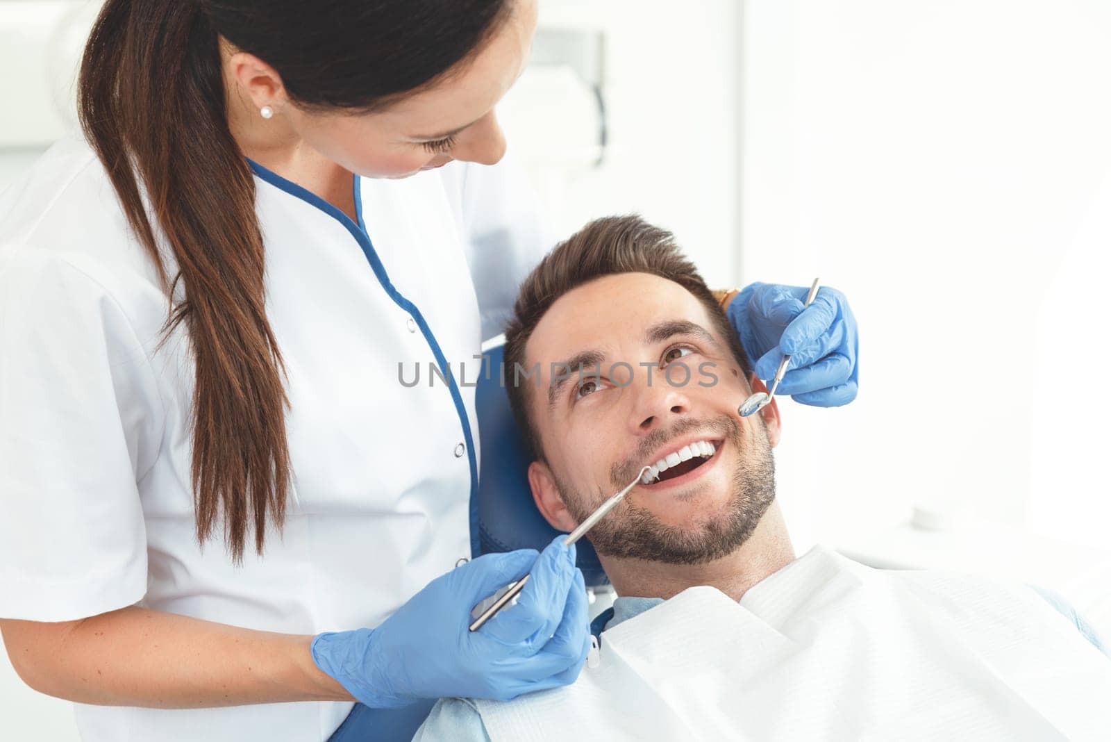 Man having teeth examined at dentists by simpson33