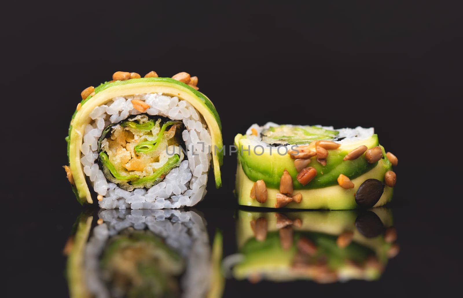 Sushi roll set on black glass background by simpson33