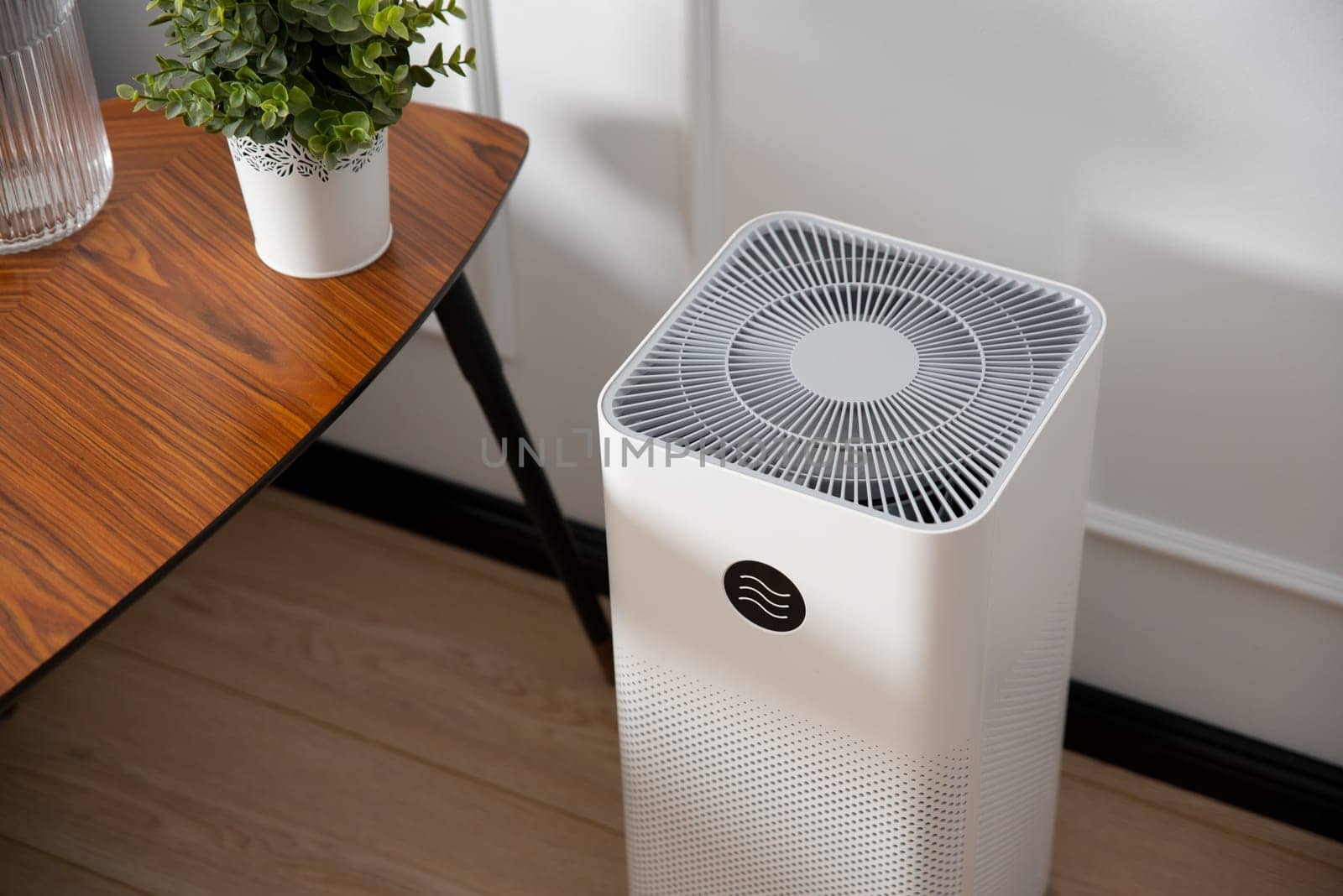 Air purifier in living room, dust protection by simpson33