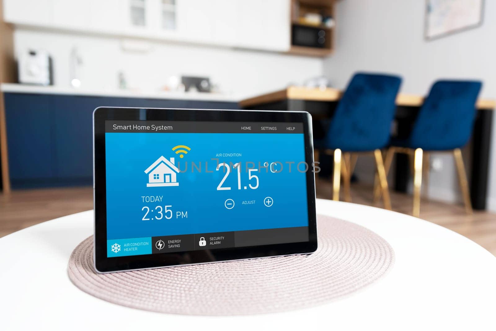 Smart home system application on digital tablet, modern home in background