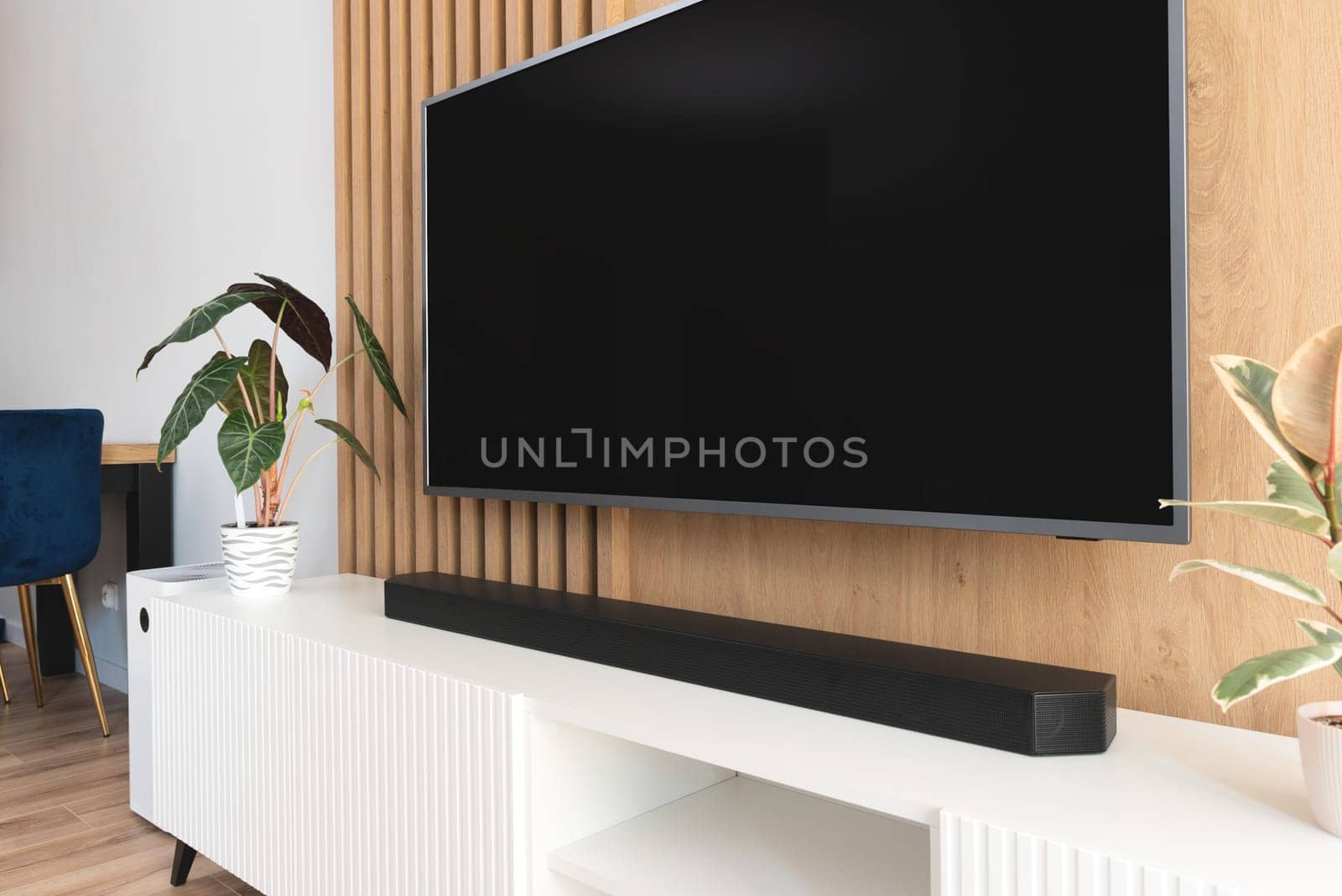 Soundbar in a modern home. Listening to music in living room
