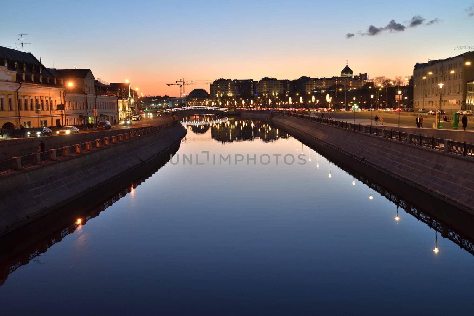 Moscow, Russia - FEB 21. 2020. Vodootvodny Canal and the Luzhkov Bridge at night