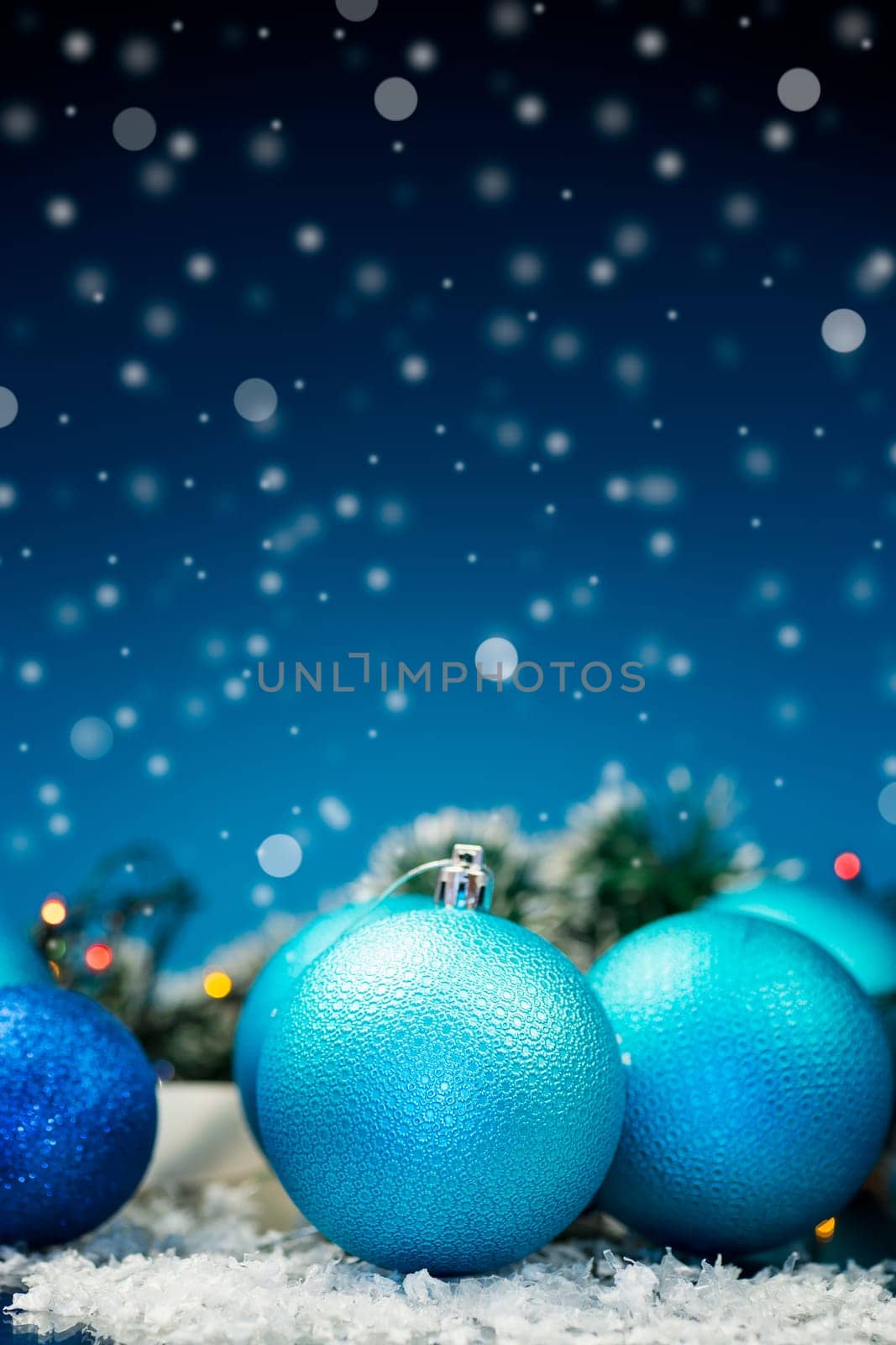 New Year's toys, decorations and other items on a blue abstract background. New Year background.