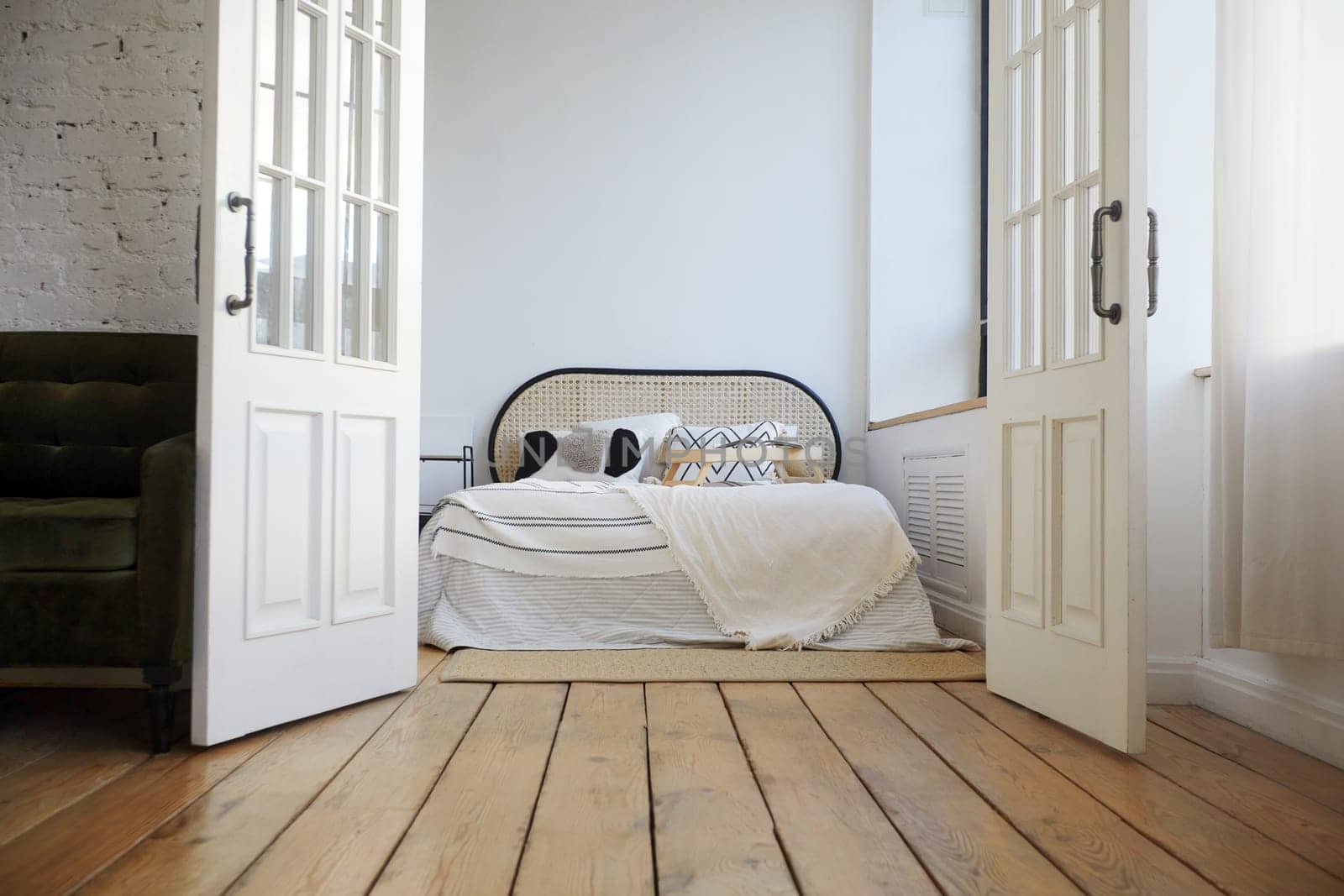 Bedroom interior with wooden floor and white walls by Demkat