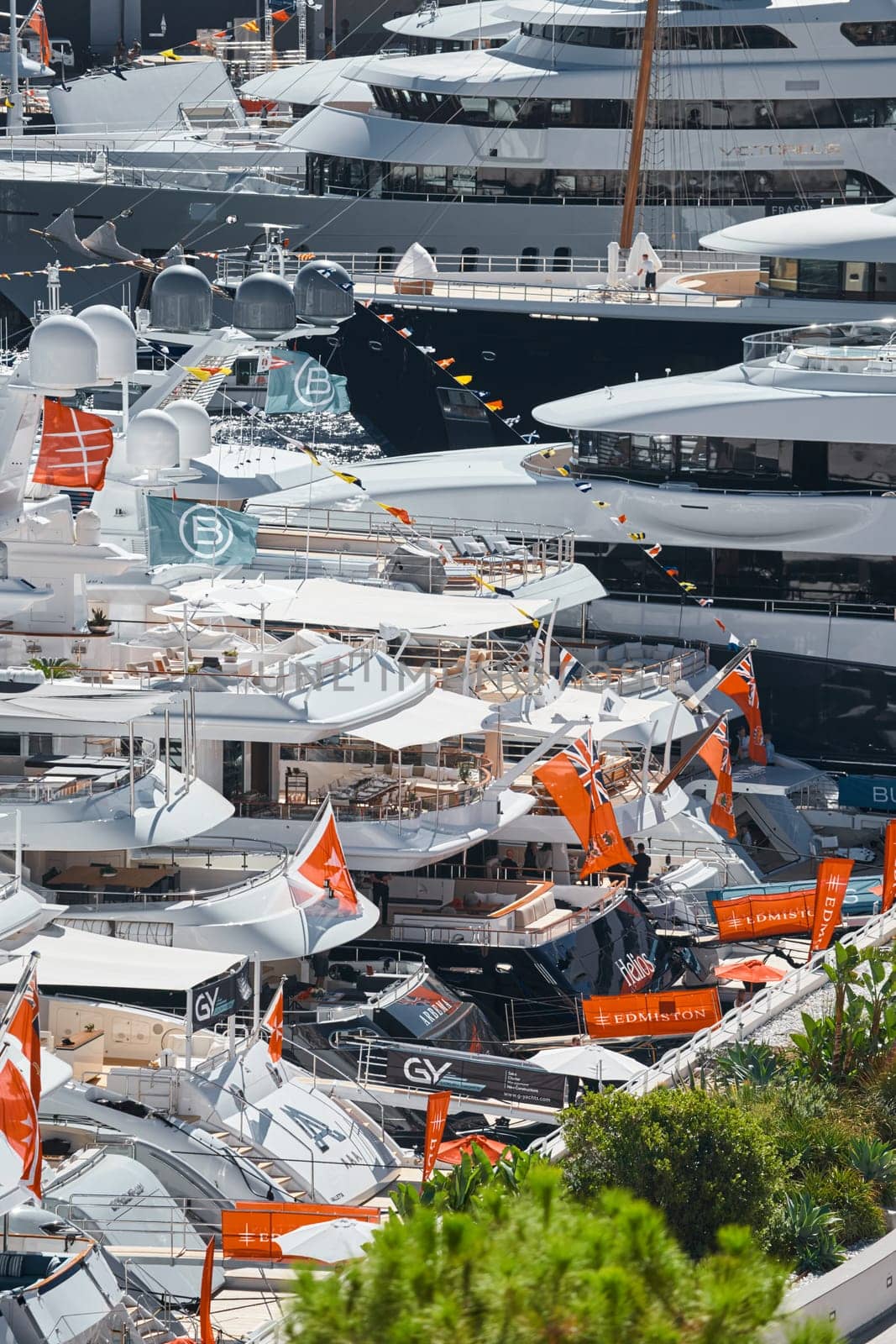 Monaco, Monte Carlo, 27 September 2022 - a lot of luxury yachts at the famous motorboat exhibition in the principality, the most expensive boats for the richest people around the world, yacht brokers. High quality photo