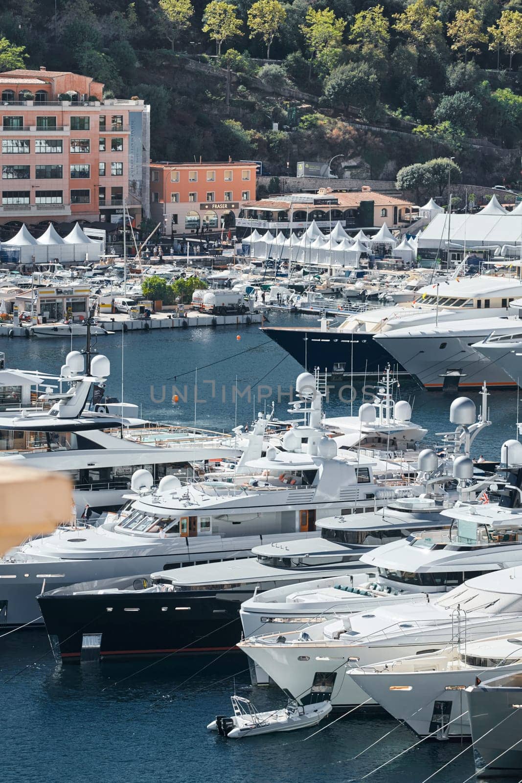 Monaco, Monte Carlo, 27 September 2022 - a lot of luxury yachts at the famous motorboat exhibition in the principality, the most expensive boats for the richest people around the world, yacht brokers. High quality photo