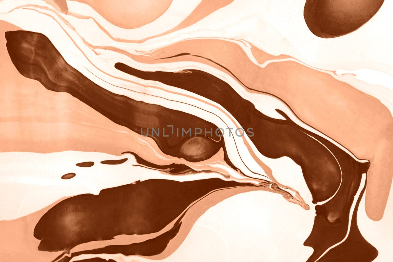 The texture of marble. Spread-out acrylic paint. Abstract background, made in the technique of fluid art. Demonstrating the colors of 2024 - Peach Fuzz.