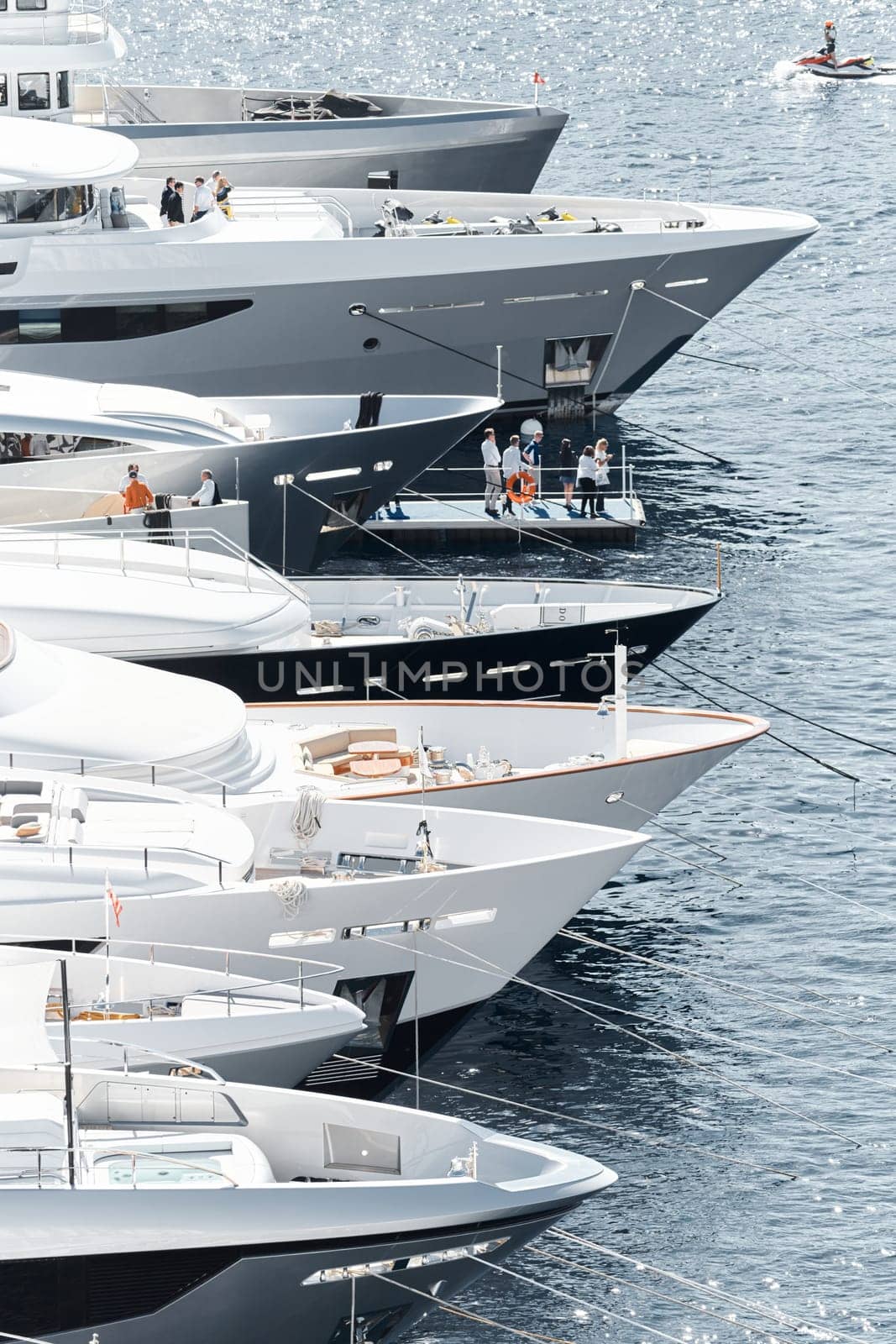 Monaco, Monte Carlo, 27 September 2022 - a lot of luxury yachts at the famous motorboat exhibition in the principality, the most expensive boats for the richest people around the world, yacht brokers. High quality photo