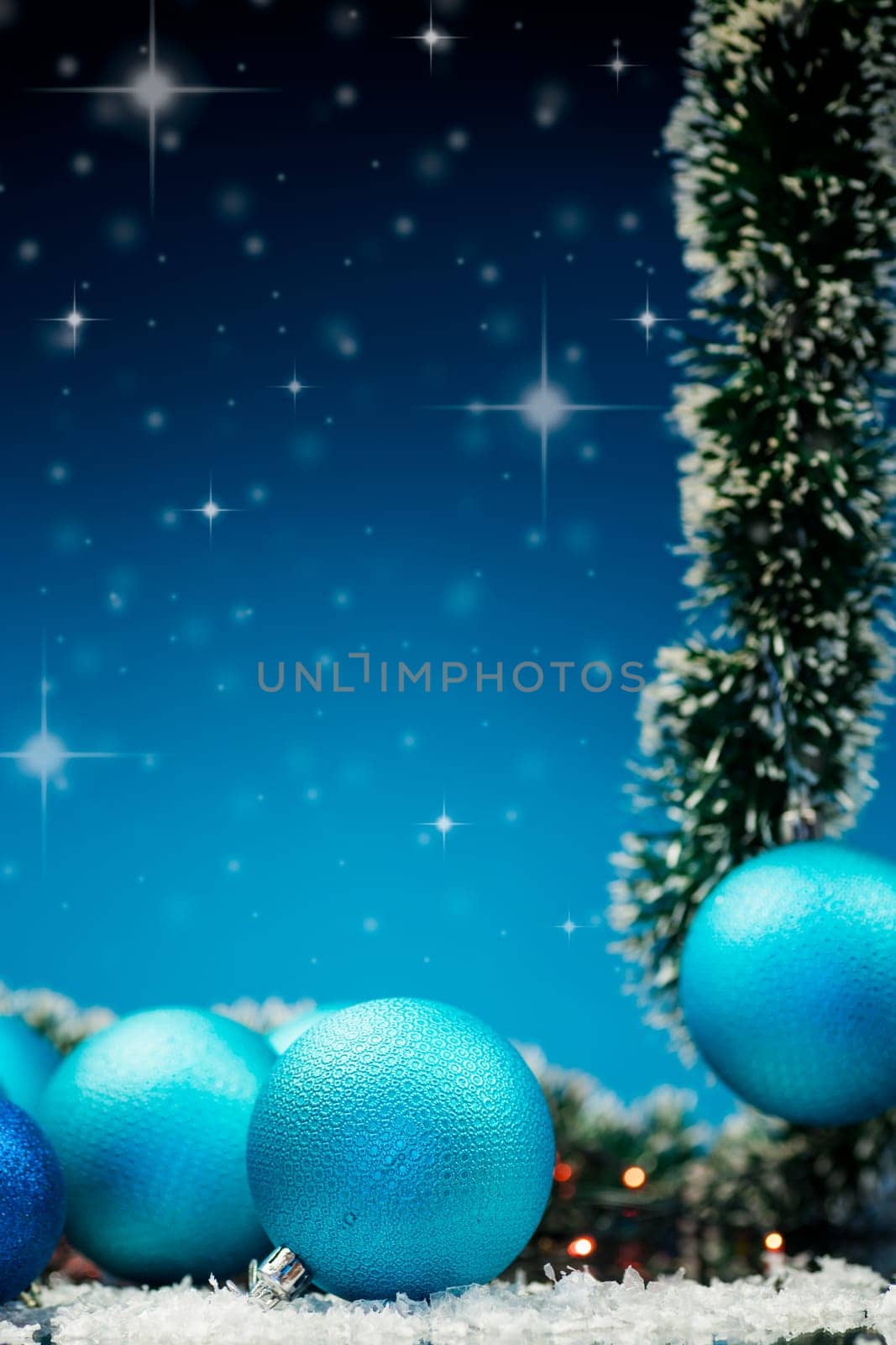 New Year's toys, decorations and other items on a blue abstract background. New Year background.