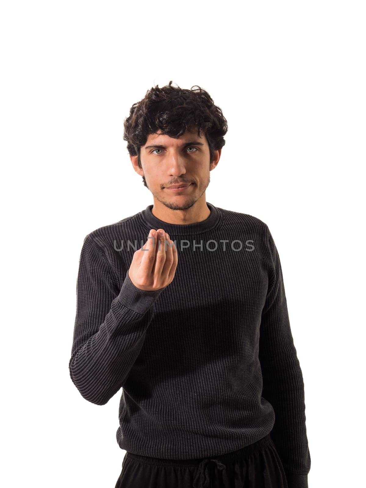 A man standing in front of a white background doing italian gesture for question or doubt, isolated on white background in studio shot