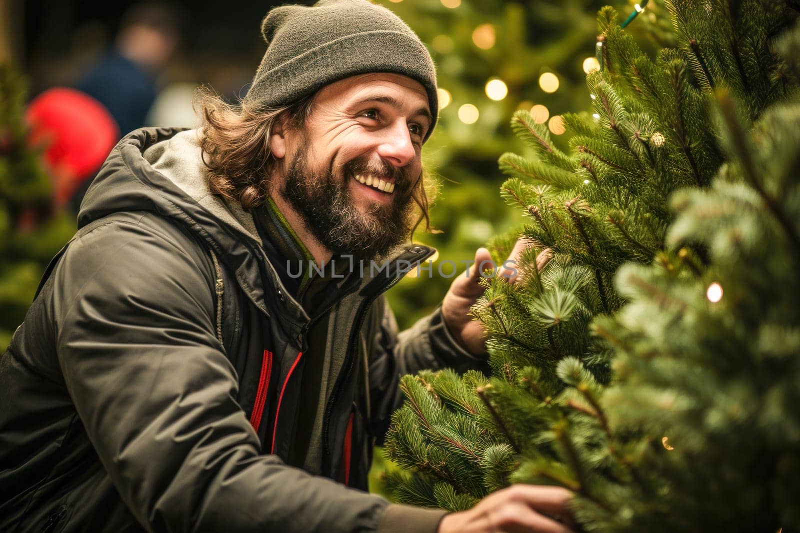 A man who carefully searches for the perfect Christmas tree in a bright and atmospheric Christmas tree market to create a festive atmosphere.
