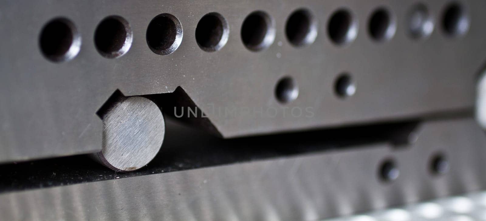 Precision Engineering Metal Peg in Hole Design Close-Up by njproductions