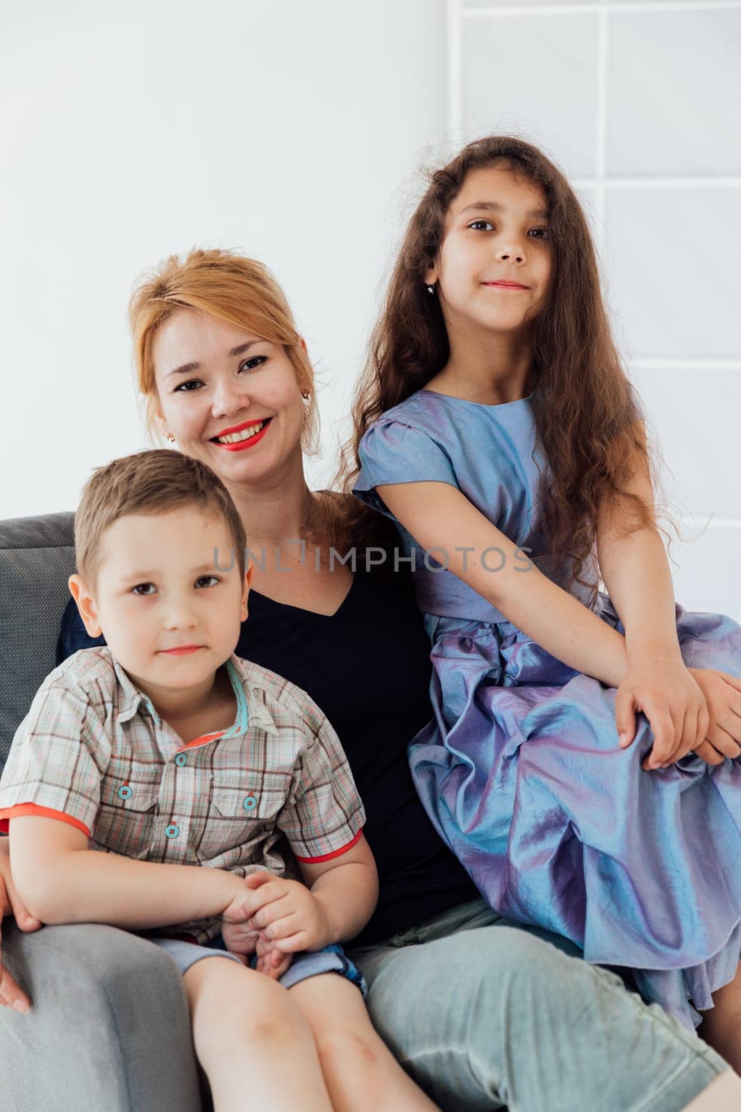 Family photo of parents with boy and girl