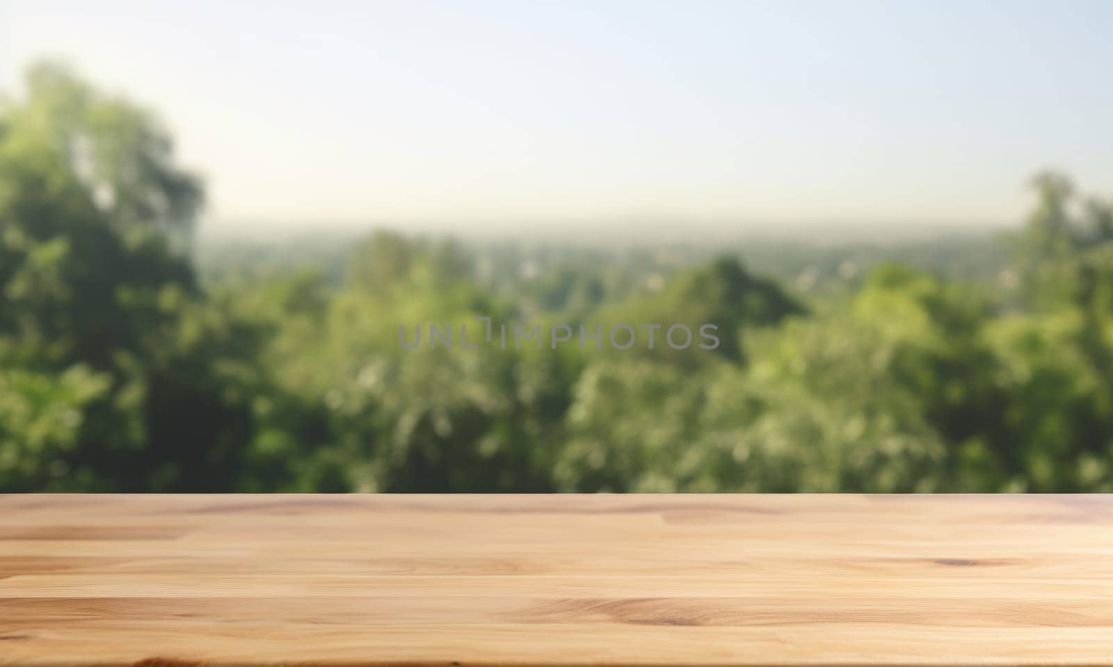 wooden tabletop over against the backdrop green trees and sky.