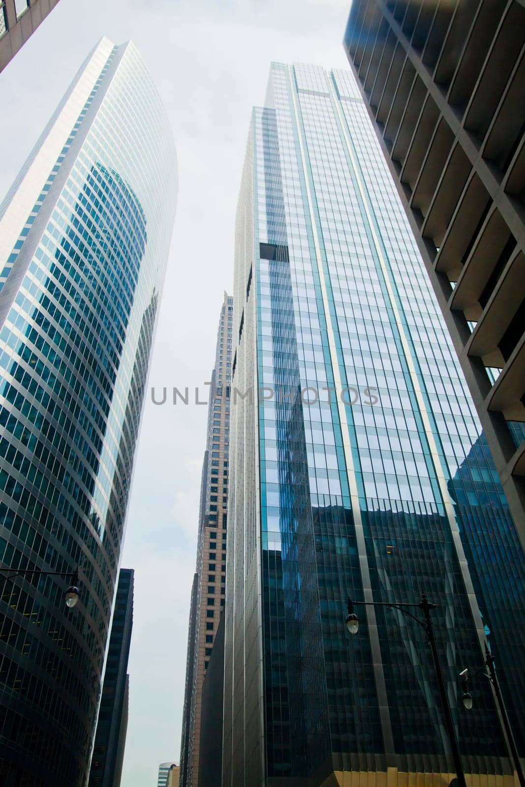 Upward View of Reflective Skyscrapers in Chicagos Business District by njproductions