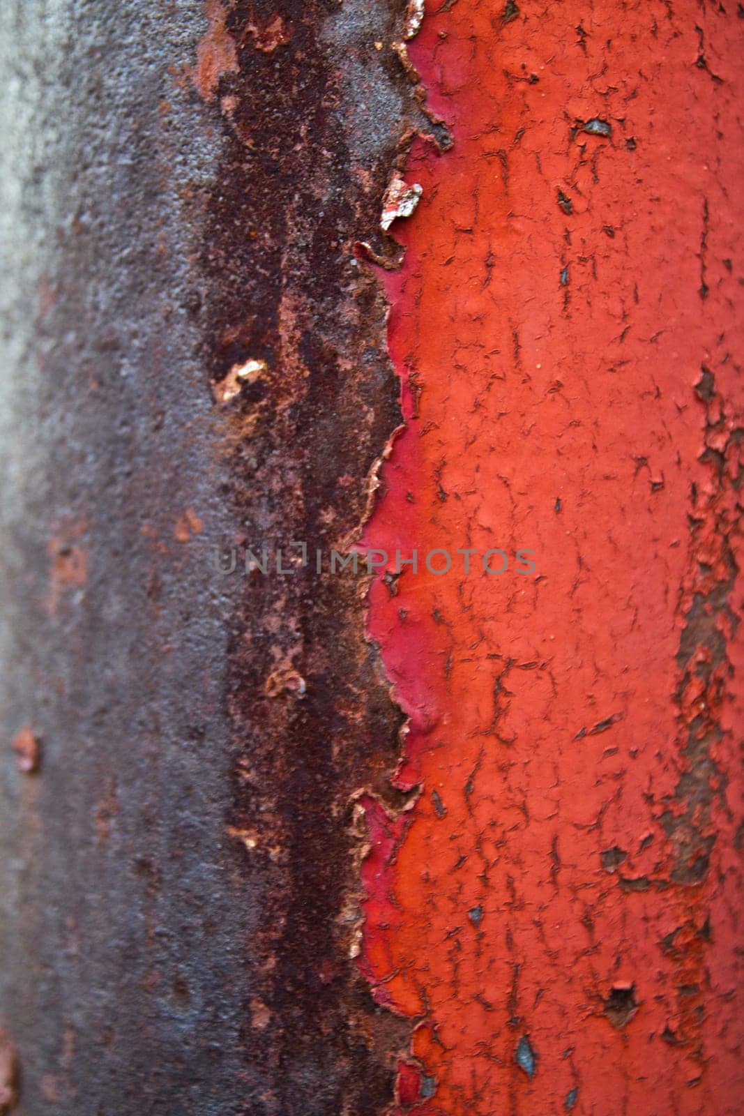 Decay and Resilience: A Close-up of Weathered Paint and Rust on an Industrial Surface in Louisville, Kentucky