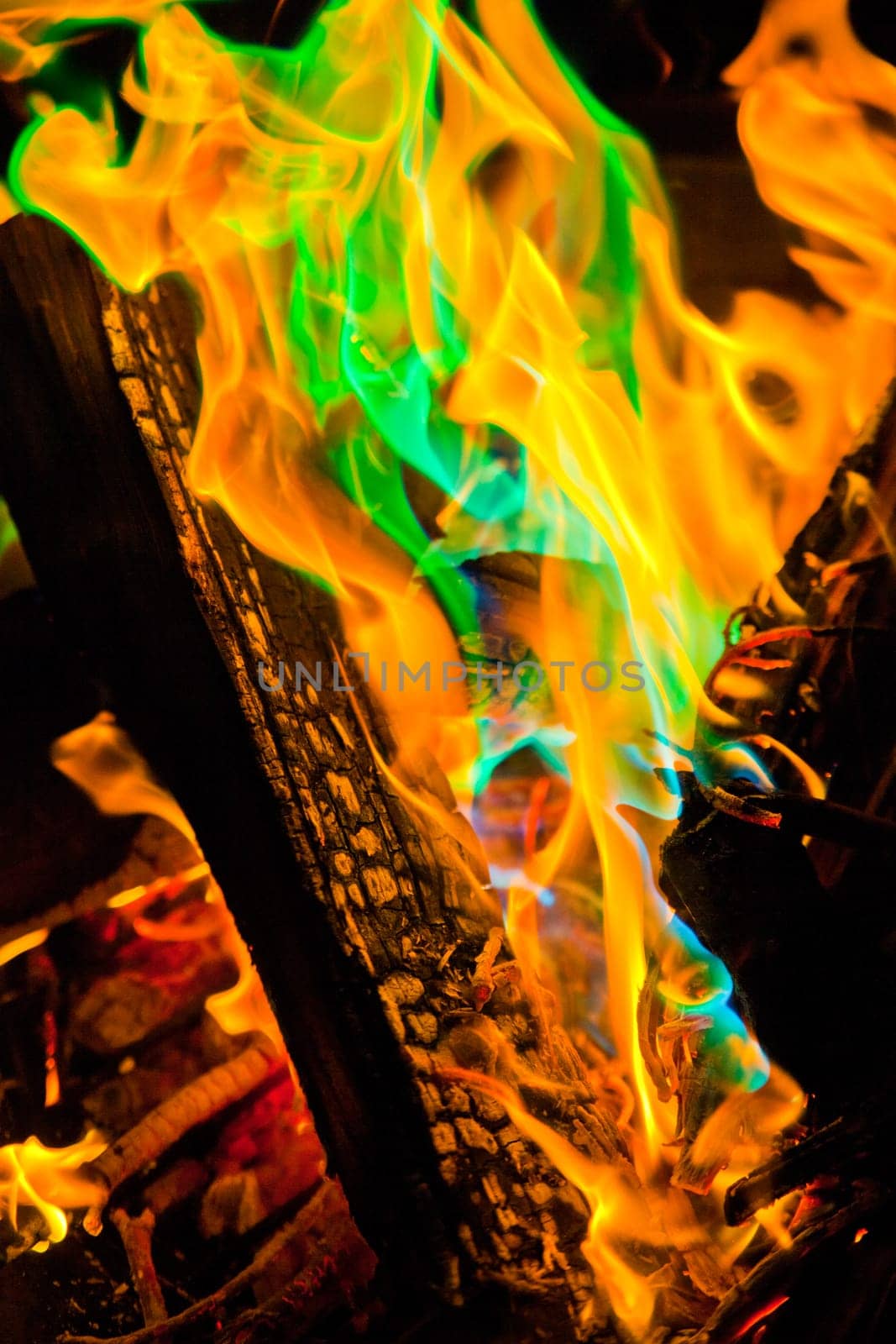 Dancing Flames in Multi-color Display Close-up by njproductions