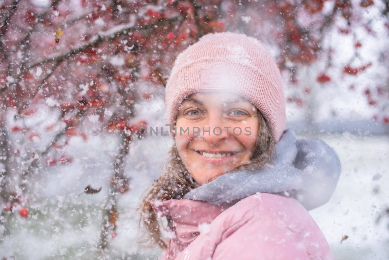 Winter Elegance: Portrait of a Beautiful Girl in a Snowy European Village