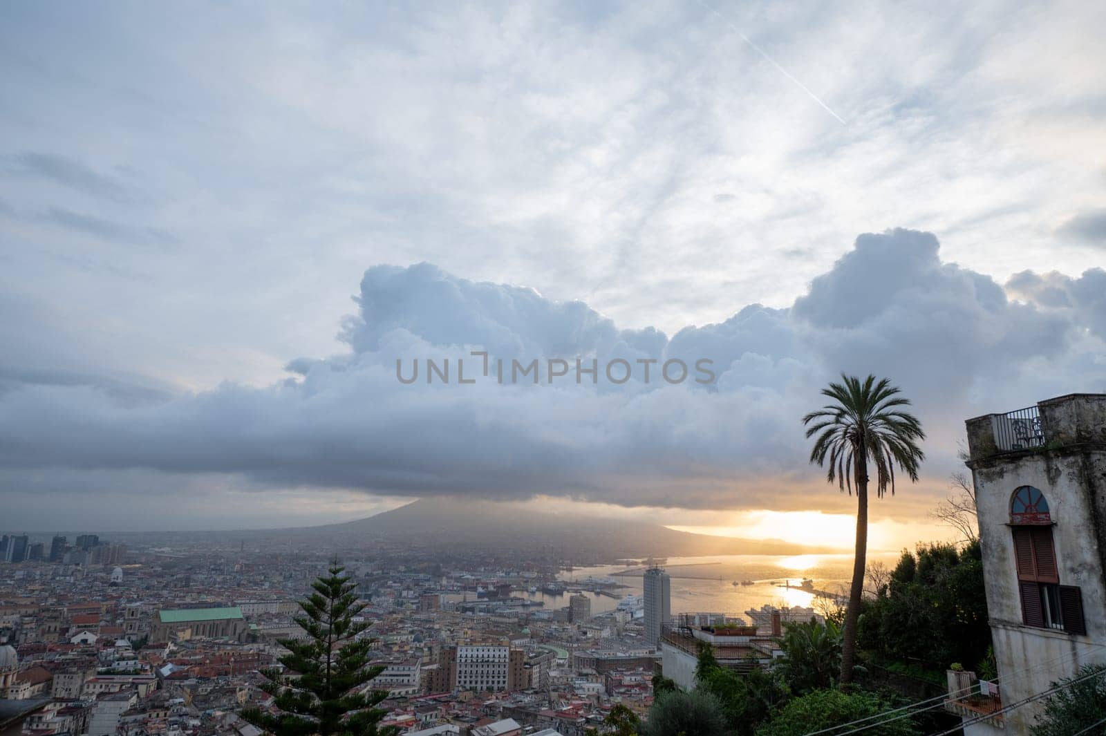 Cityscape of the city of Napoli in the morning with Vesuvius in the background by martinscphoto