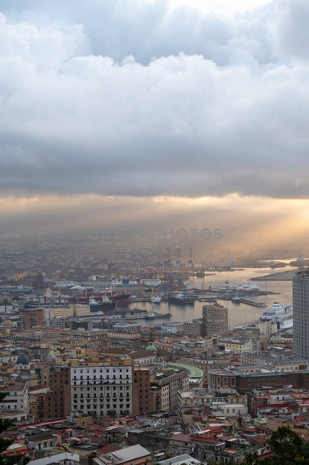 Panorama of the sea port of the city of Napoli in the morning with Vesuvius in the background by martinscphoto