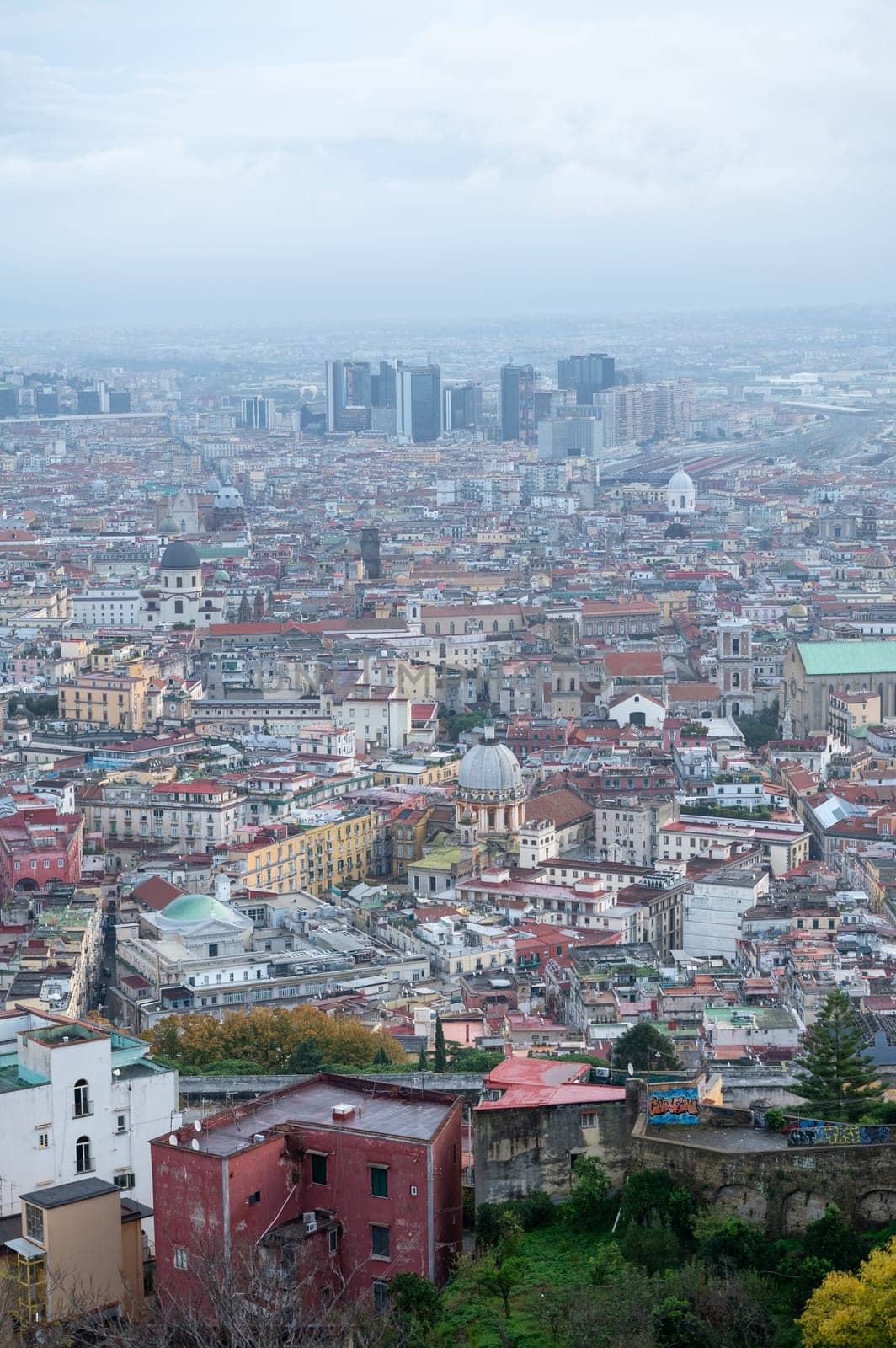Cityscape of the city of Napoli in the morning with Vesuvius in the background.