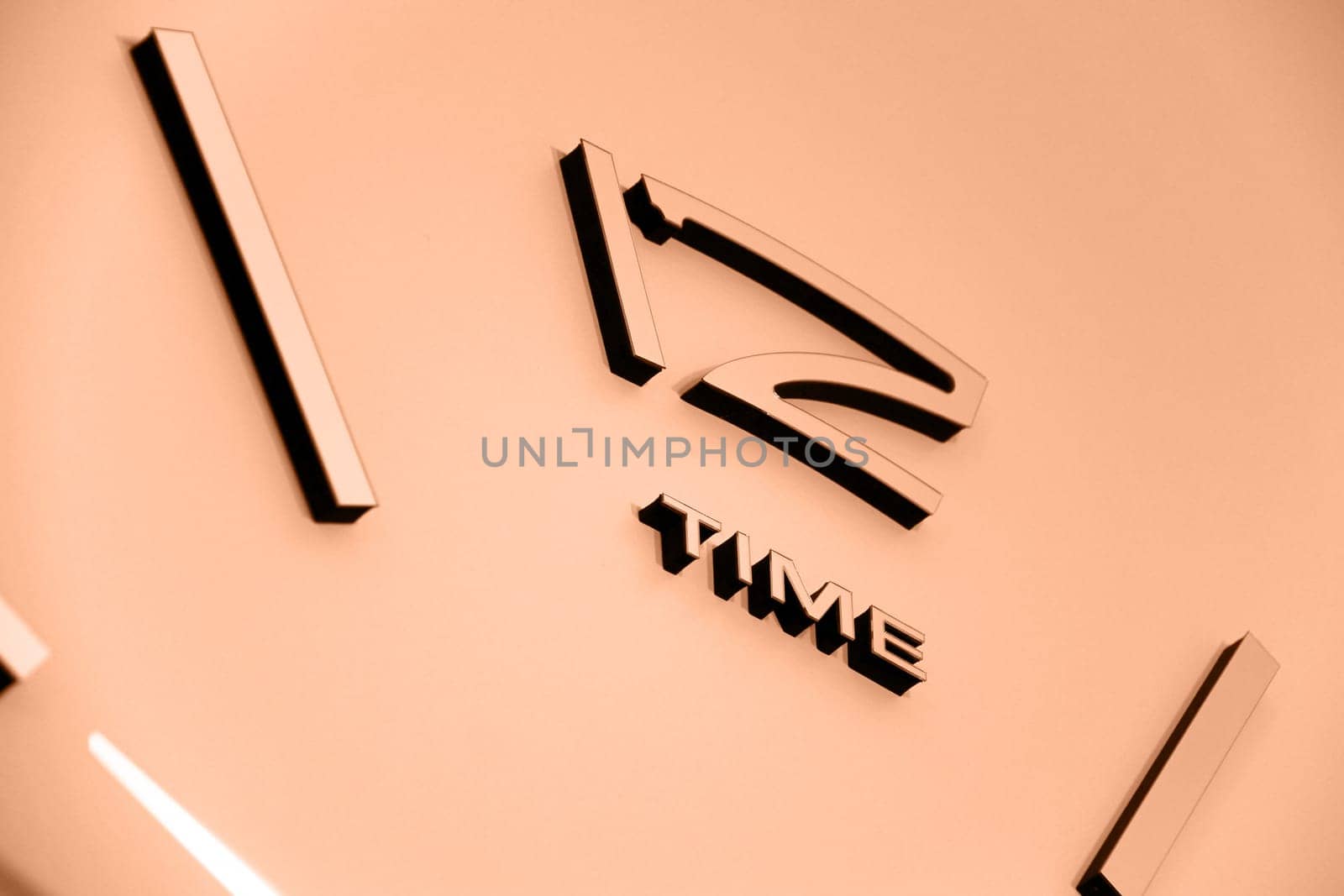 Image with big clocks. Image toned in Peach Fuzz color of the year 2024. New Fashion colour. Top view. Abstract time view. Lost time concept
