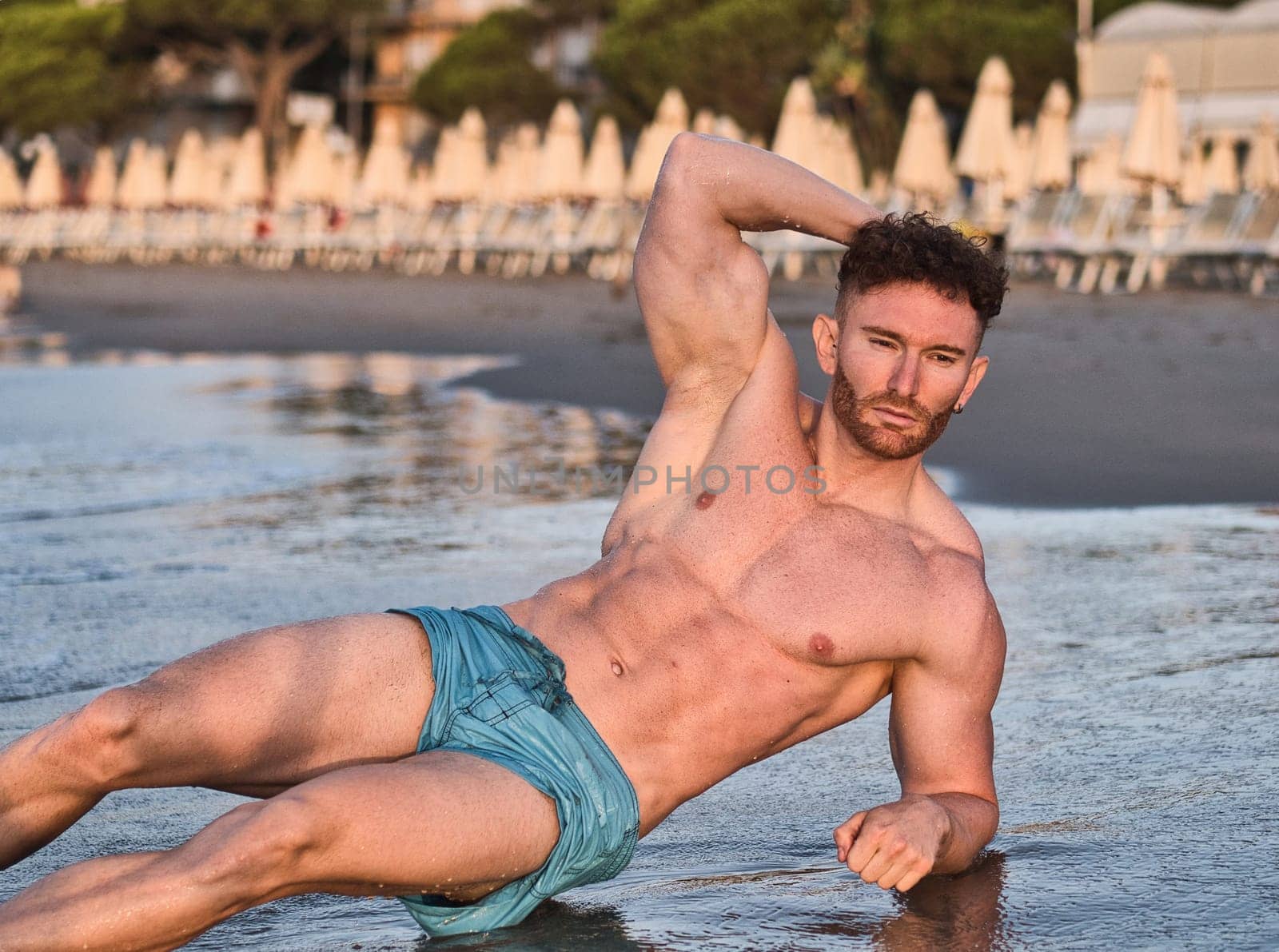 Man Relaxing on the Beach by artofphoto