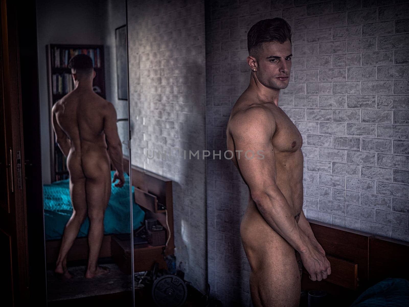 Photo of a male figure contemplating his reflection in a mirror by artofphoto