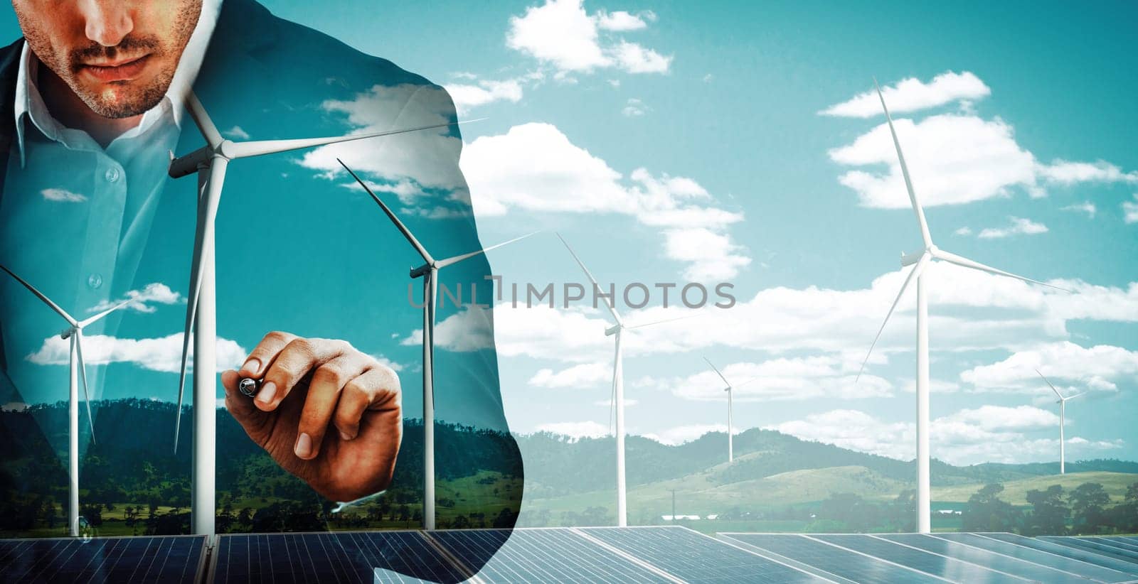 Double exposure graphic of business people working over wind turbine farm and green renewable energy worker interface. Concept of sustainability development by alternative energy. uds