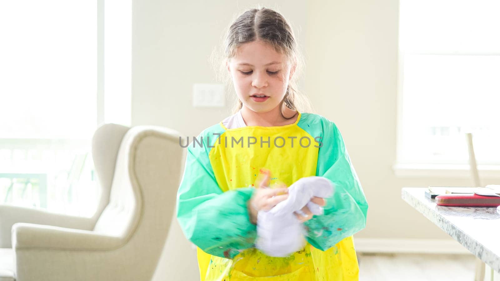 Homeschooled Little Girl Crafting Slime in Modern Kitchen by arinahabich