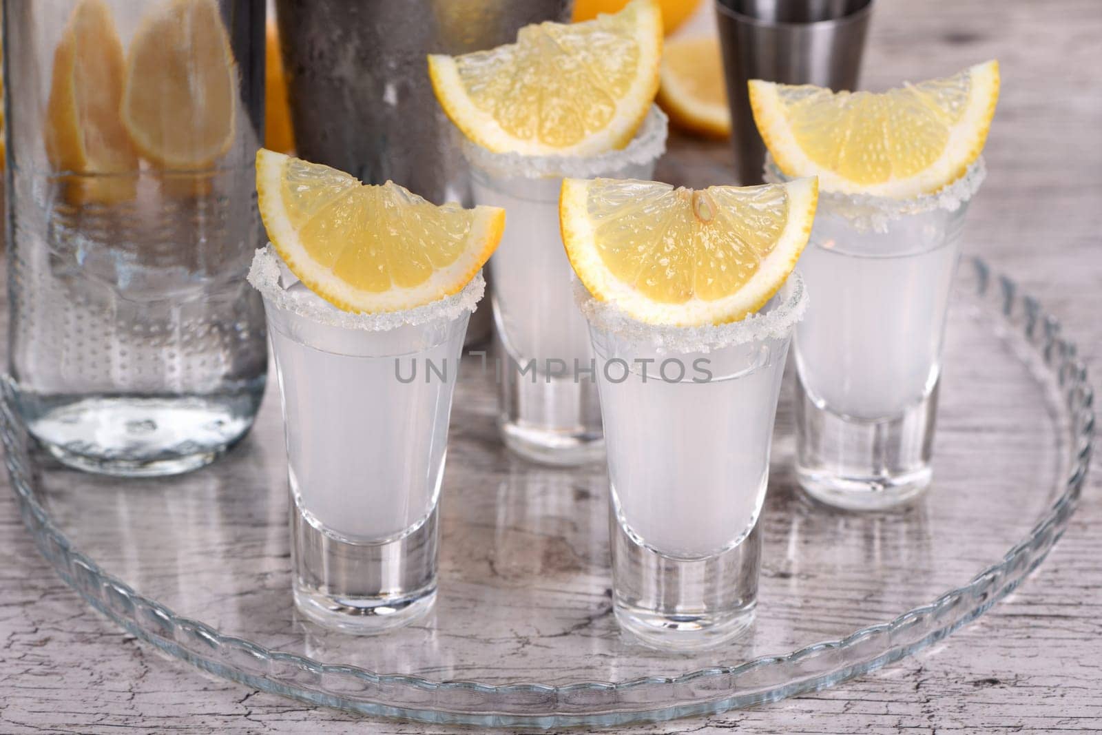 Shots vodka with lemon by Apolonia