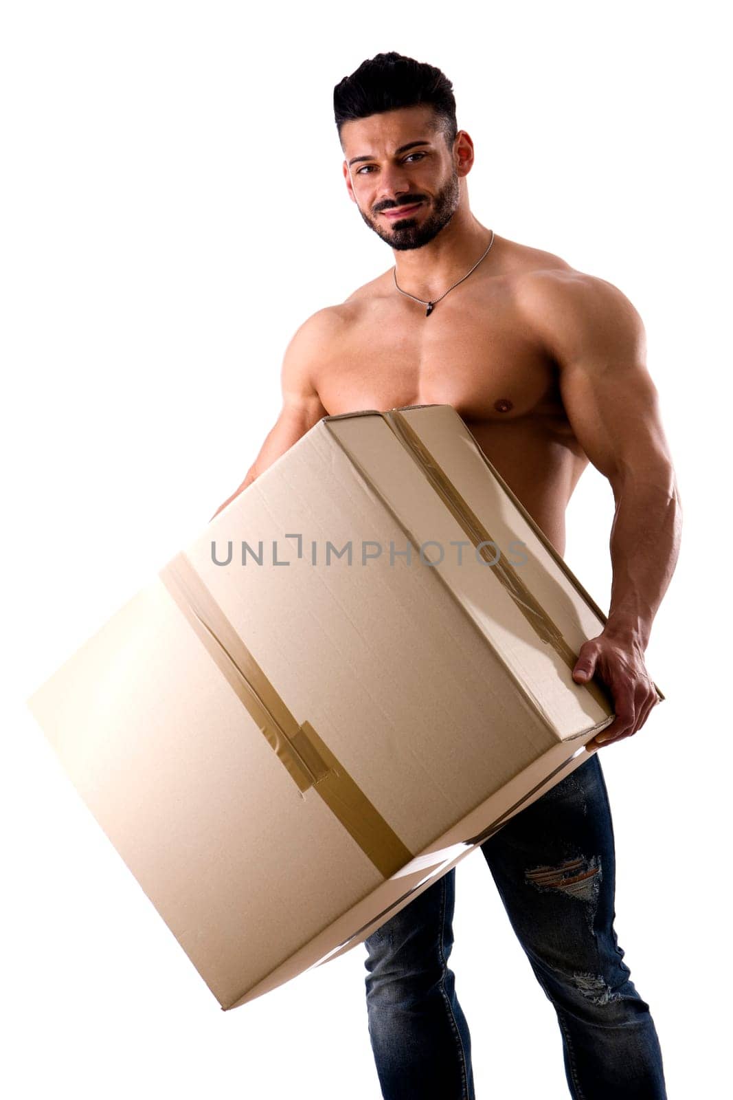 A shirtless man holding a large box with his strong muscular arms