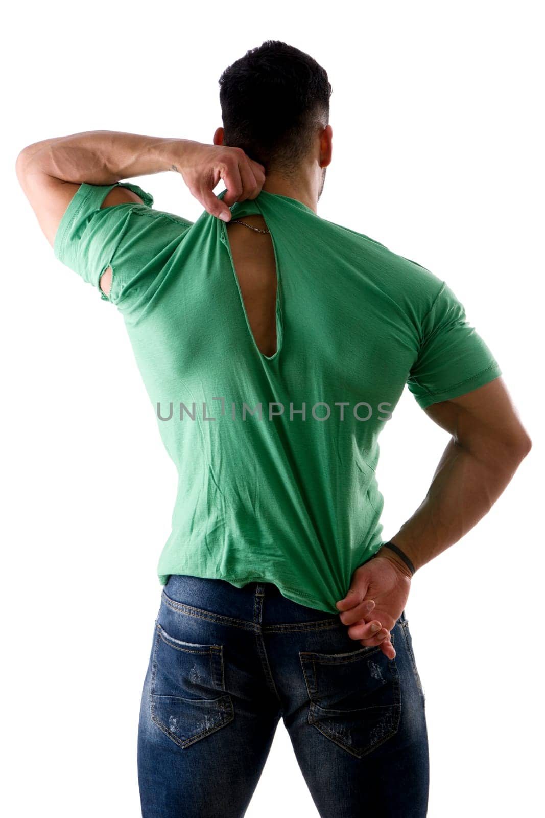 Unrecognizable strong man in ripped t shirt by artofphoto