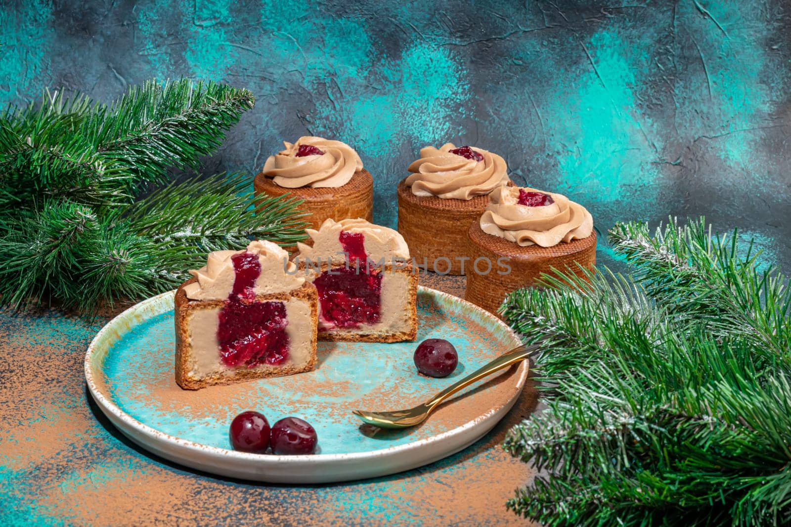 Cakes filled with cream and cherry jam. Box eclairs. New Year and holiday concept. by klimatis019