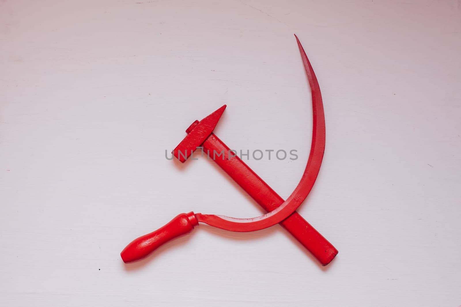 red sickle and hammer symbol of communism in the Soviet Union history of Russia by Simakov
