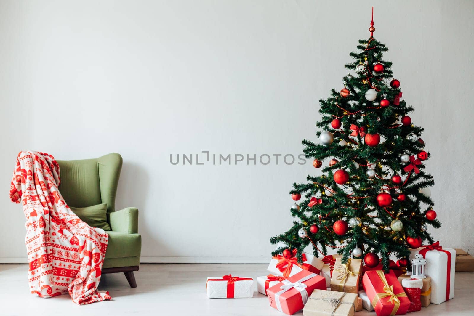 Christmas tree with red decor gifts for the new year holiday