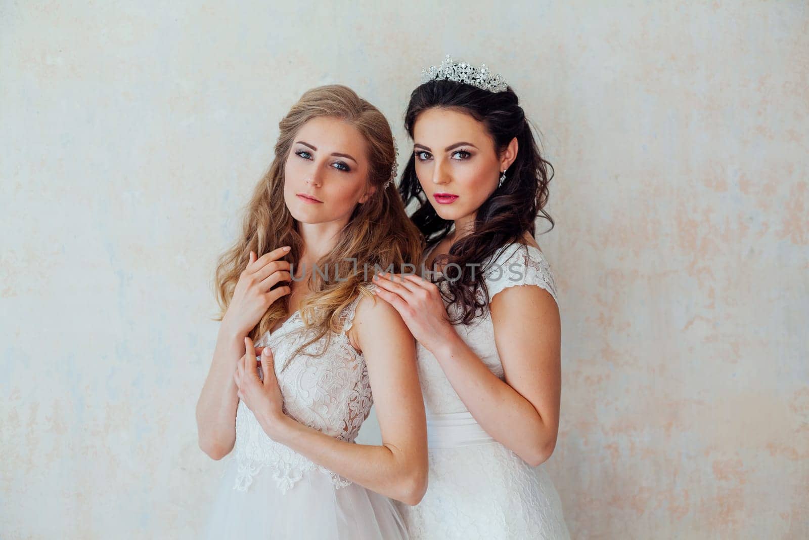two girls in white dresses brunette and blonde by Simakov