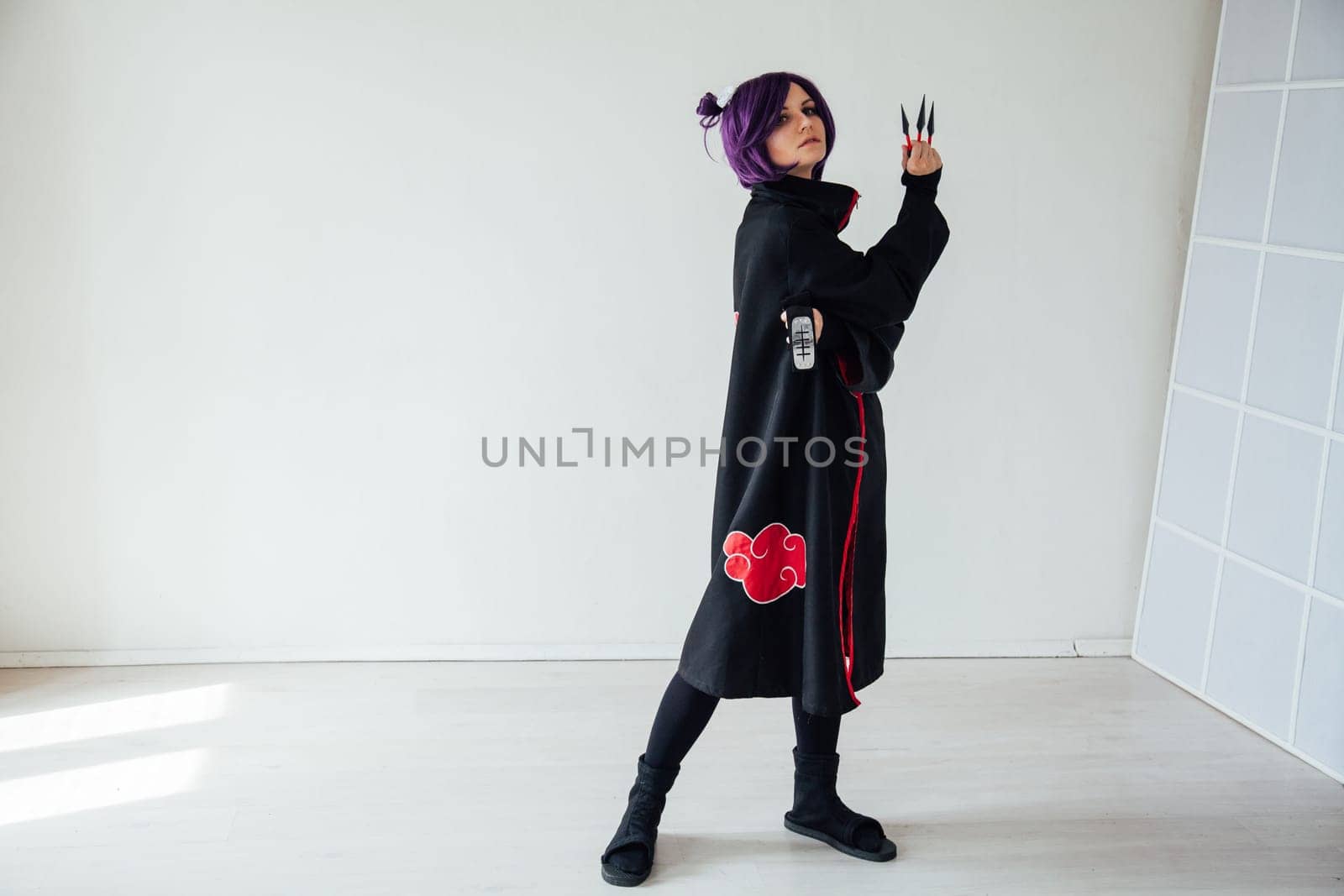 Beautiful woman anime cosplayer with purple hair Japan by Simakov